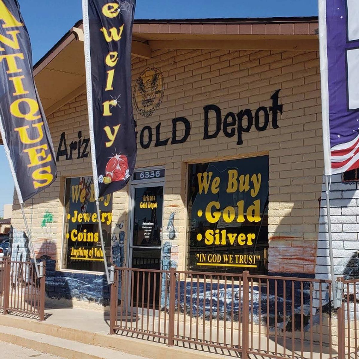 Arizona Gold Depot storefront on Main Street in Mesa, with We Buy Gold and Silver signs